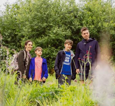Family looking at flowers